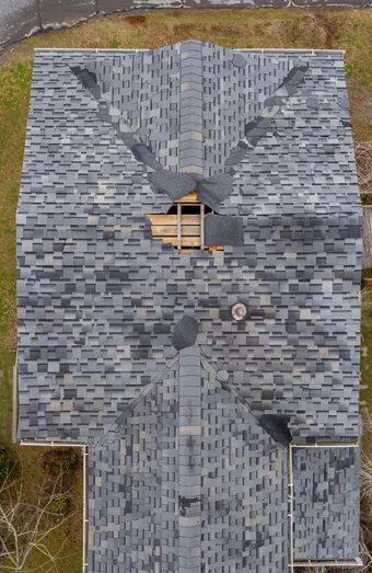 Storm Damage Roof Replacement X